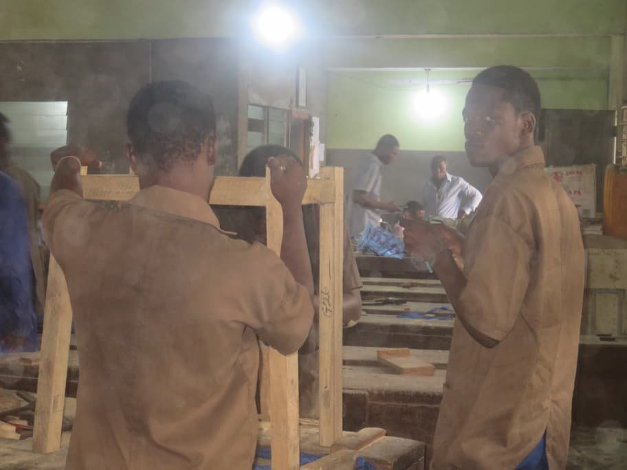 SAHTECH wood construction students working on a project